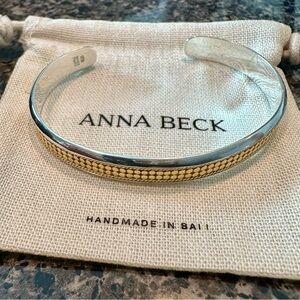 Anna Beck 18 karat gold bracelet, and sterling silver on the inside
